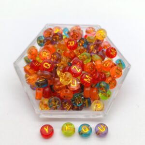 ENSAMBLE ACRÍLICO PASTILLA TRASLUCIDA TUTTY LETRA DORADA